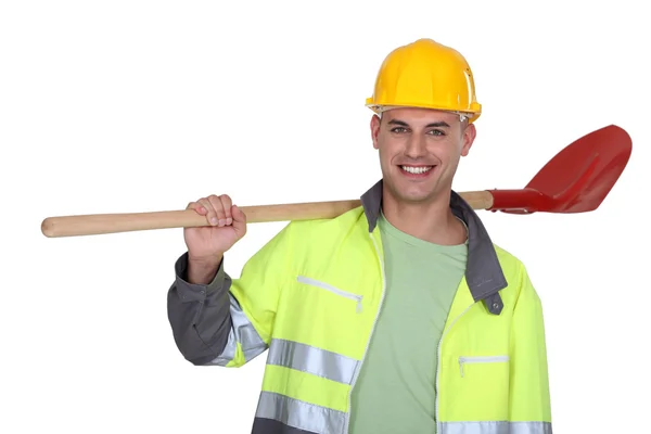 Trabalhador da construção com uma pá — Fotografia de Stock