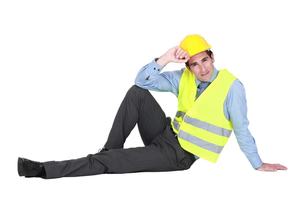 Real estate businessman lying on the floor — Stock Photo, Image