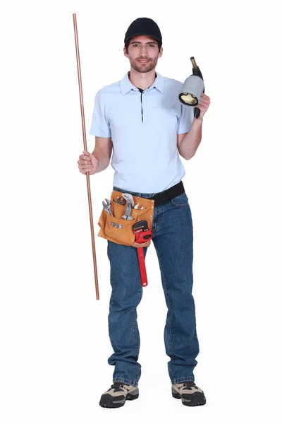 Plumber with a blowtorch — Stock Photo, Image