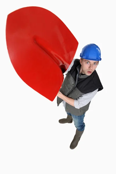 Mason raising spade in the air — Stock Image Mason raising spade in the air Royalty Free Stock Images