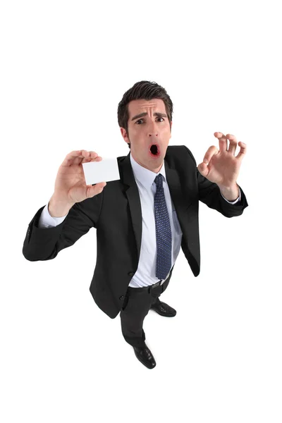 Man shouting with card in hand — Stock Photo, Image