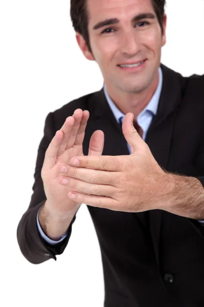 A businessman clapping hands. — Stock Photo, Image