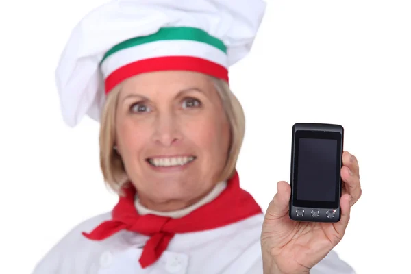 Cook mostrando telefone — Fotografia de Stock