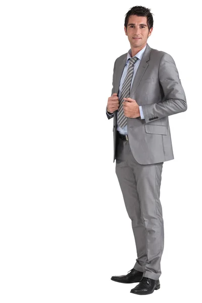Businessman holding jacket — Stock Photo, Image
