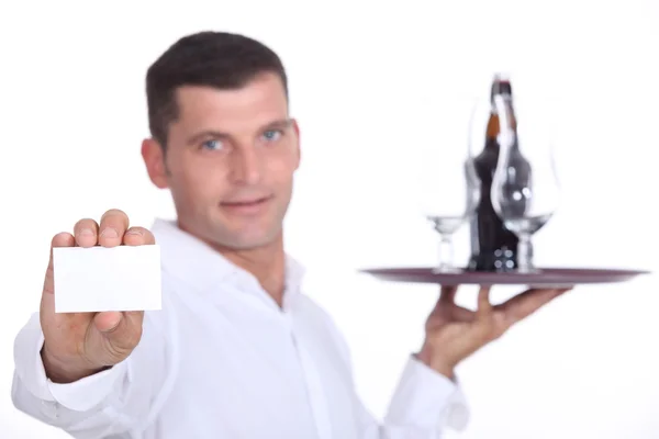 Waiter holding tray and business card — Stock Photo, Image