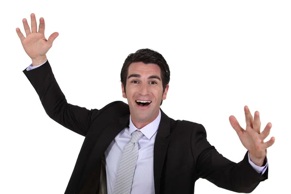 Happy businessman raising hands Royalty Free Stock Images