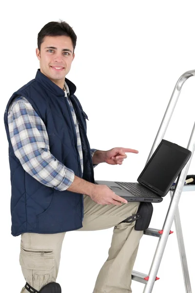 Tiles checking e-mails at work — Stock Photo, Image