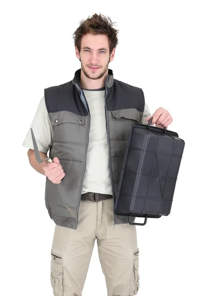 Tile fitter posing with his building supplies — Stock Photo, Image