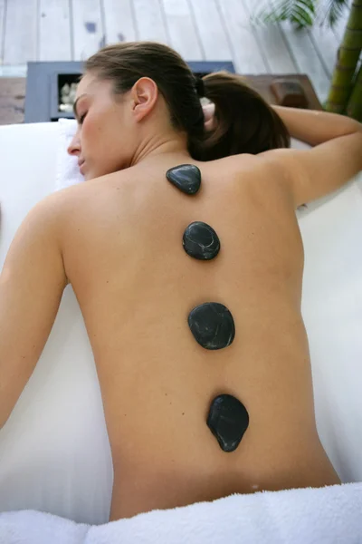 Hot stone massage — Stock Photo, Image