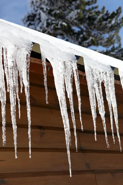 Stalactite hanging from chalet — Stock Photo, Image