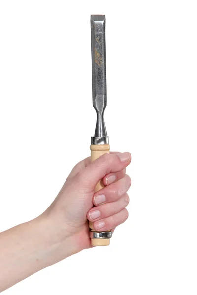Una mano che tiene uno scalpello . — Foto Stock