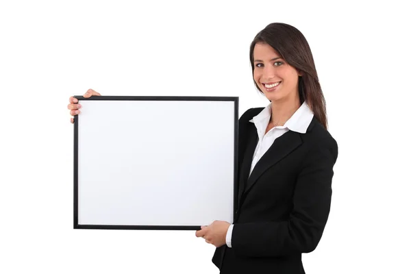 Woman holding white board — Stock Photo, Image