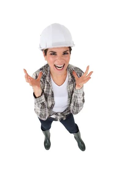 An angry female construction worker. — Stock Photo, Image