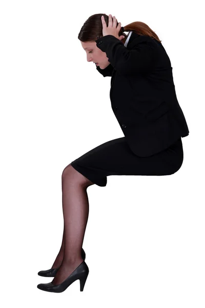 Stressed businesswoman with a headache — Stock Photo, Image