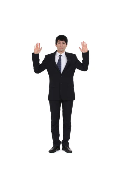 Attractive businessman hands up — Stock Photo, Image