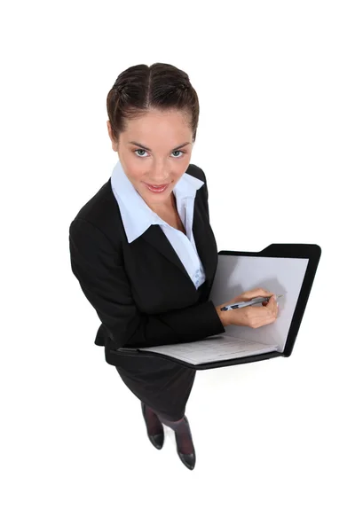 Mujer inteligente con un cuaderno — Foto de Stock