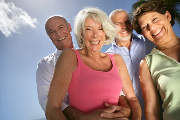 Two happy senior couples — Stock Photo, Image