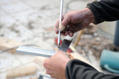 Handyman using set-square clipart