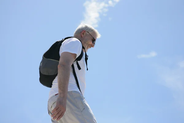 Senior on a hike — Stock Photo, Image