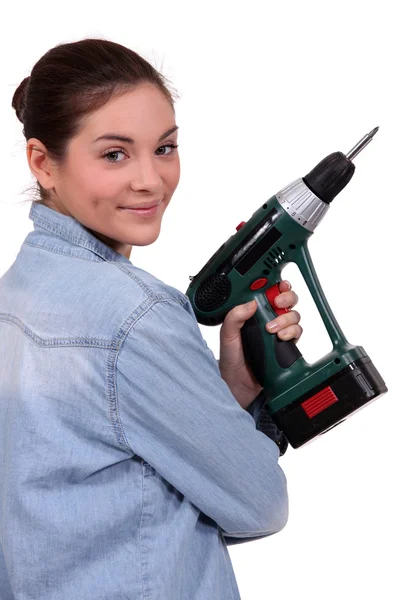 Woman holding a screwdriver Royalty Free Stock Images