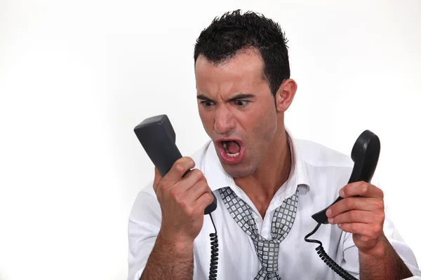 Man shouting at telephone — Stock Photo, Image