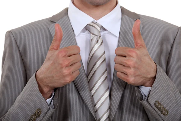 A businessman giving the thumbs up. — Stock Photo, Image