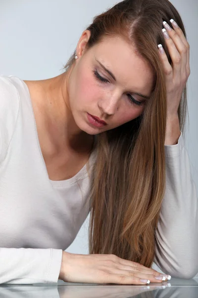 Blond woman with a headache — Stock Photo, Image