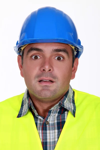 Alarmed construction worker — Stock Photo, Image