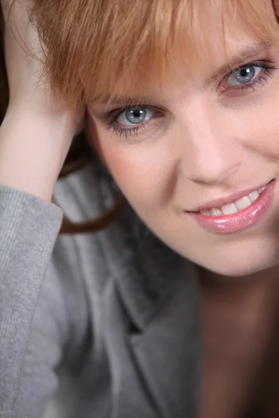 Portrait of redhead woman with blue eyes — Stock Photo, Image