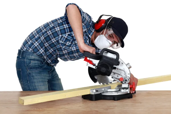 Carpenter using circular saw — Stock Photo, Image