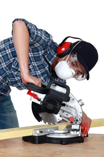 Man using a circular saw — Stock Photo, Image