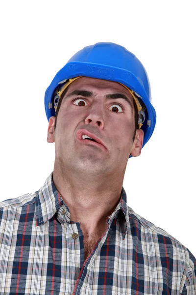 顔をゆがめた労働者の肖像画 — ストック写真