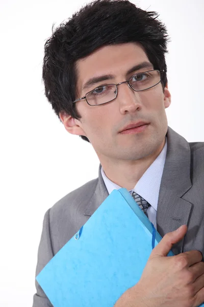 A businessman hugging his folder. — Stock Photo, Image