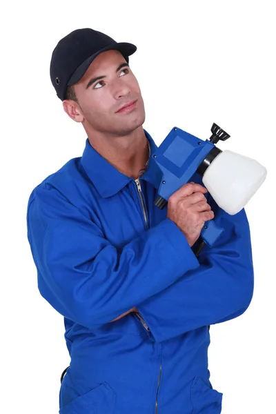 Workman in jumpsuit looking upwards — Stock Photo, Image