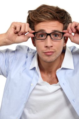 Bleary eyed man in glasses clipart