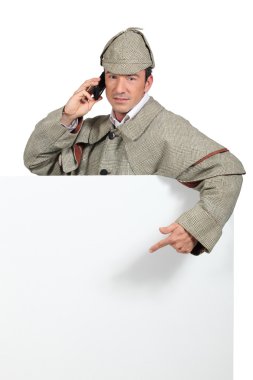 Man dressed in detective costume clipart