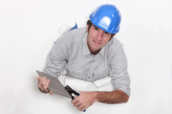 Dělník pomocí dlaždice uštipující — Stock fotografie
