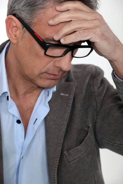 Empresário de meia-idade stressado — Fotografia de Stock