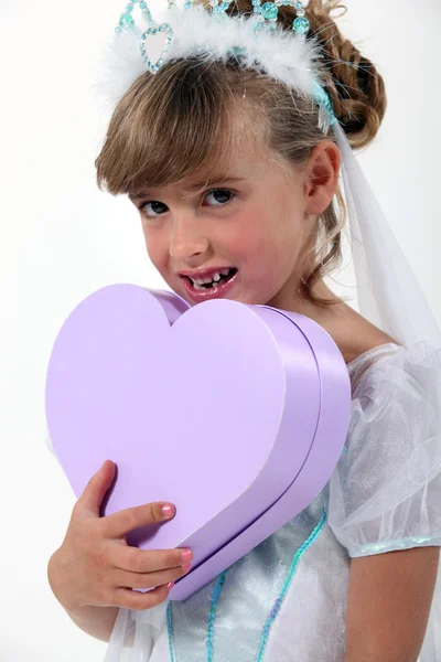 Little princess holding hear-shaped box — Stock Photo, Image