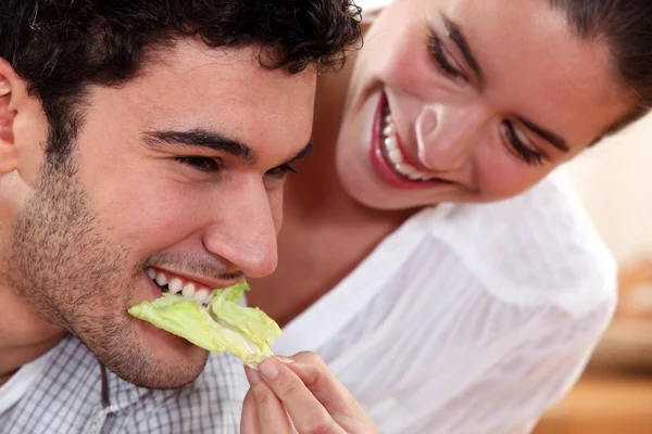 A couple sharing food. — Stock Photo, Image