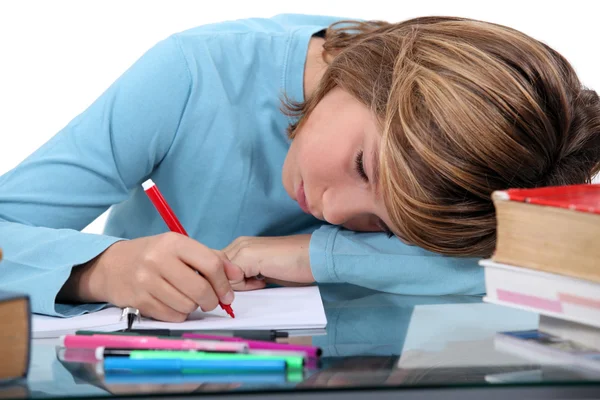 Уставший ребенок делает домашнее задание Лицензионные Стоковые Изображения