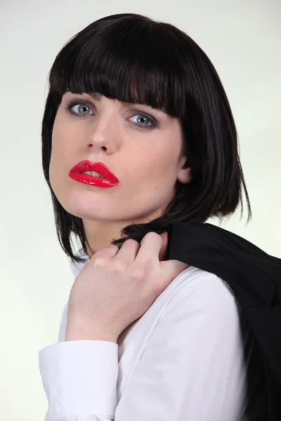 Iconic businesswoman wearing red lipstick — Stock Photo, Image