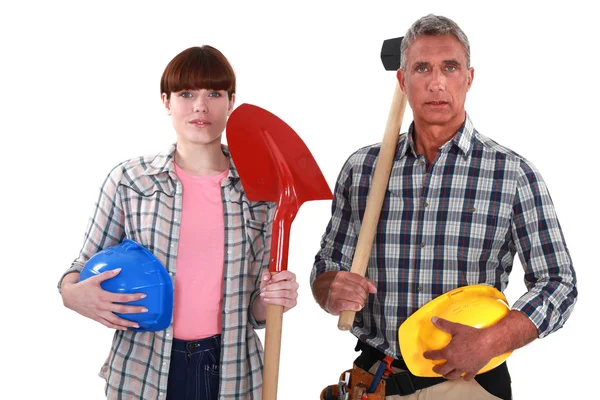 Two generations of builders — Stock Photo, Image