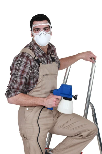 Plumber climbing a ladder — Stock Photo, Image