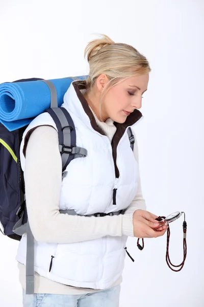 Blonde girl with compass — Stock Photo, Image