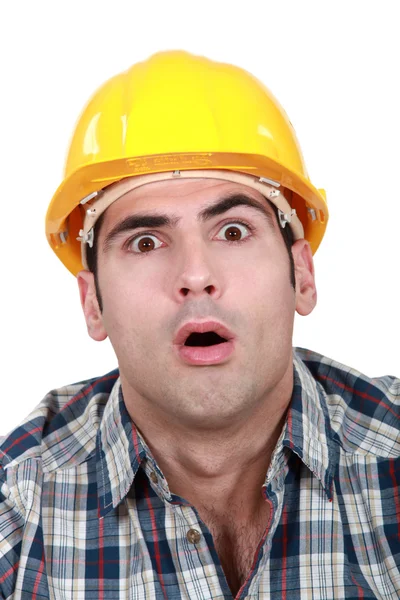 An astonished tradesman — Stock Photo, Image