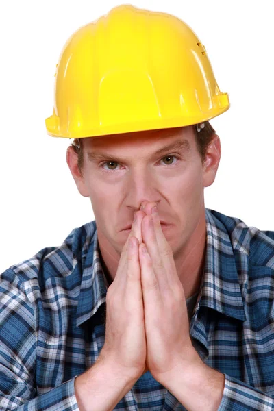 Építőmunkás imádkozik — Stock Fotó