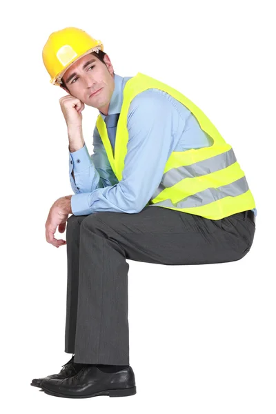 Architect thinking whilst sat down — Stock Photo, Image