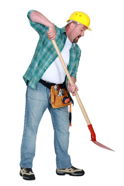 Construction worker using a spade — Stock Photo, Image