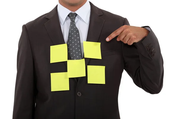 Empresário coberto de notas pegajosas em branco — Fotografia de Stock